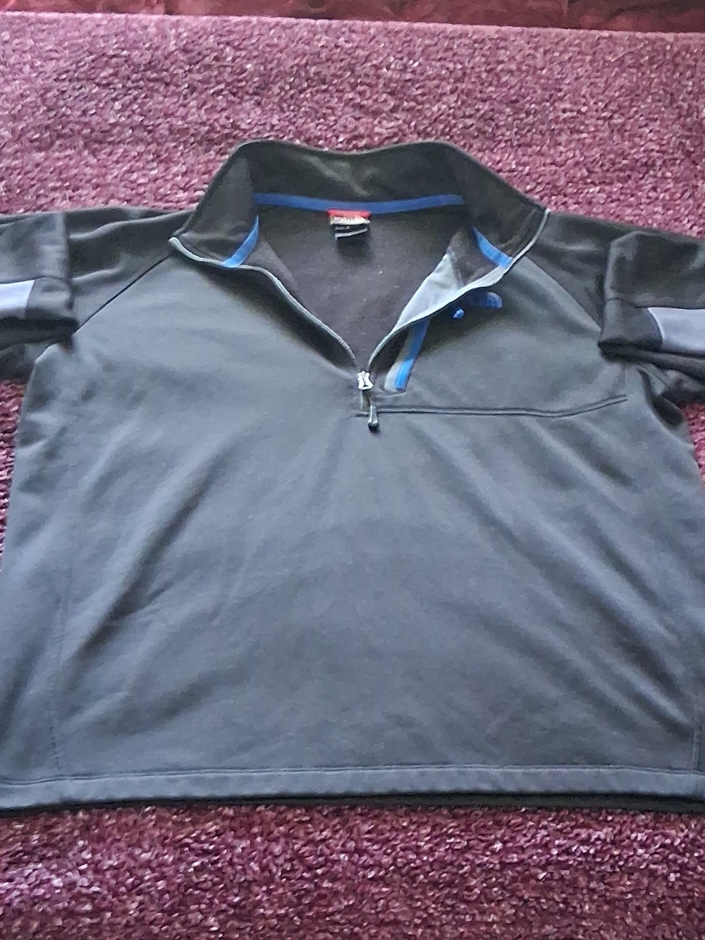 The North Face Men's Black Zip-Up Pullover with Blue Accents